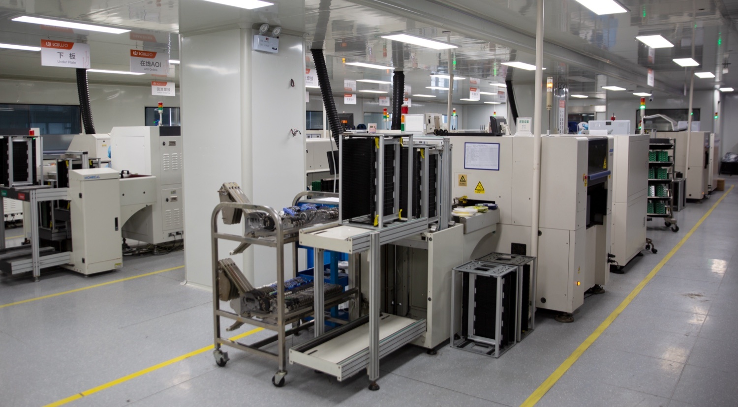 Automated assembly line running the length of the production hall