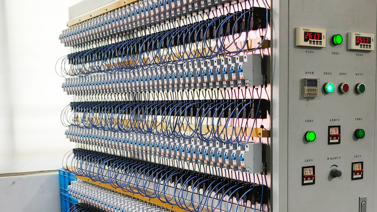 Breakers wired in rows across a test rack for trip-characteristic verification